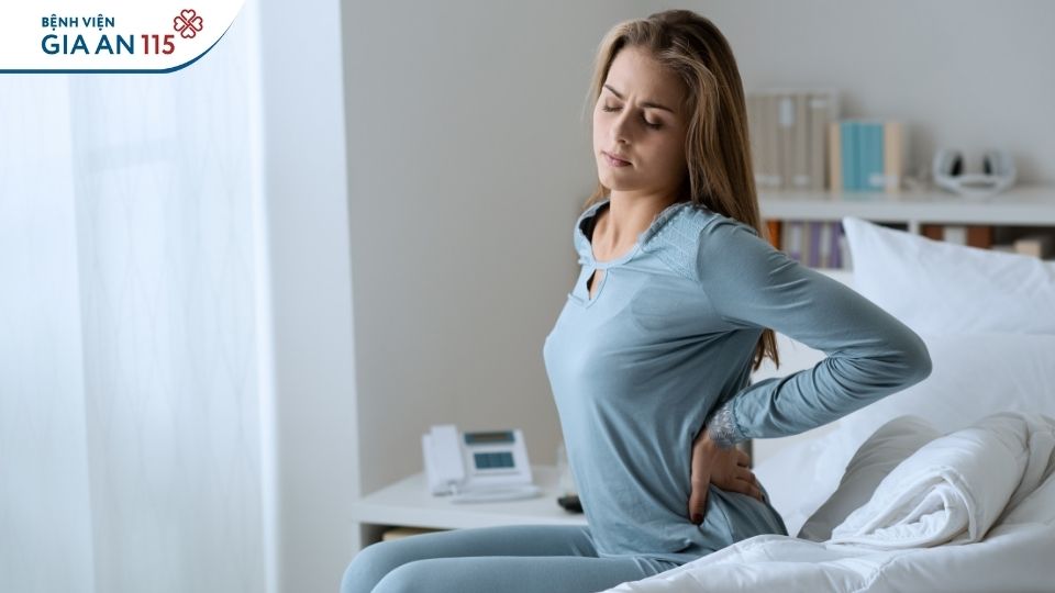 Đau lưng âm ỉ có phải mang thai? 